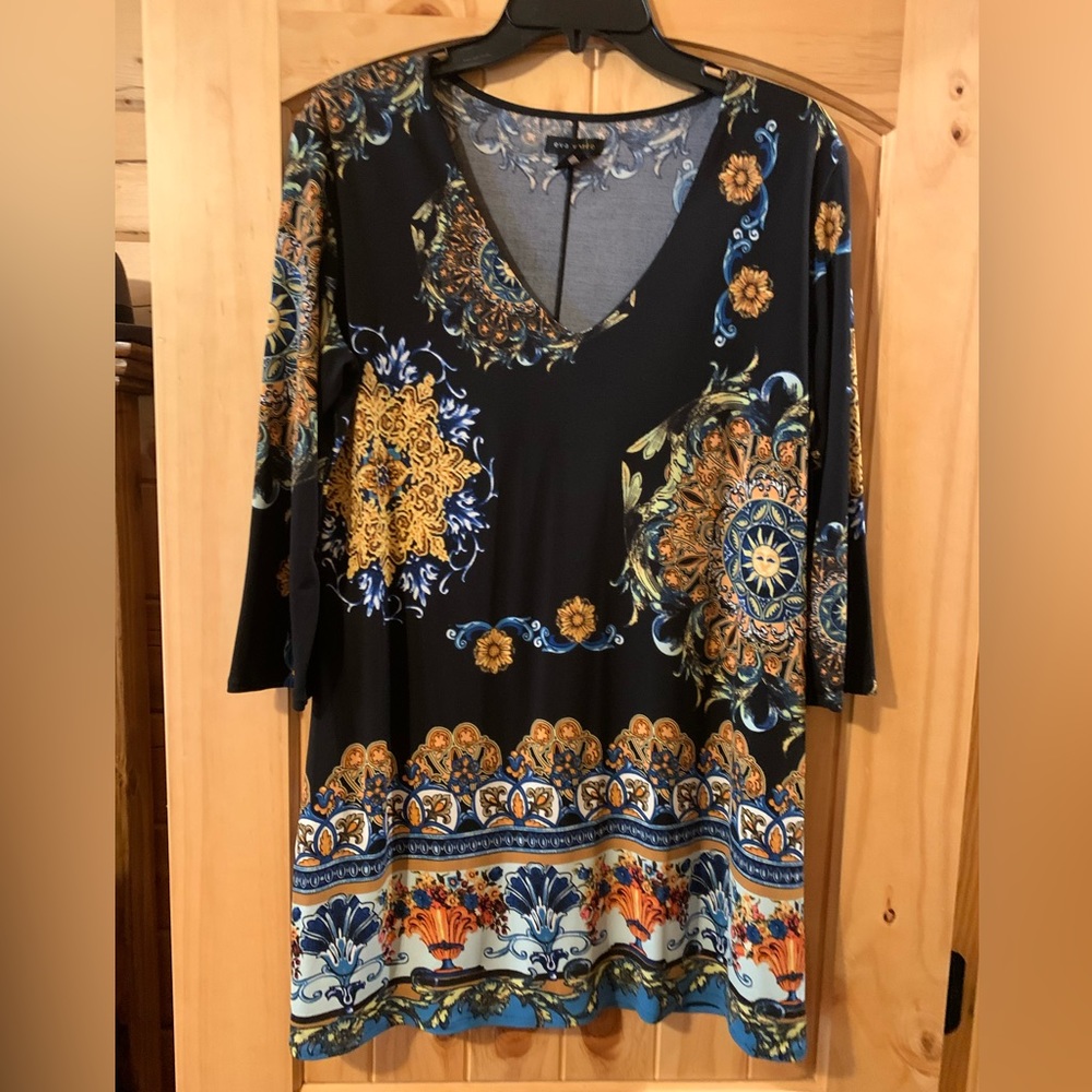 Black and multi color ladies Eva Varro polyester/spandex top with 3/4 sleeve